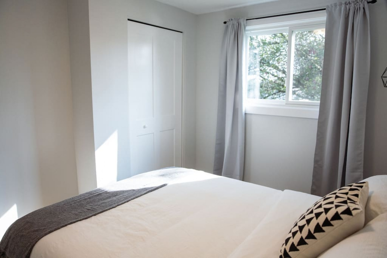 As you enter the bedroom, the comfortable bedding and peaceful atmosphere create the perfect retreat from the day.