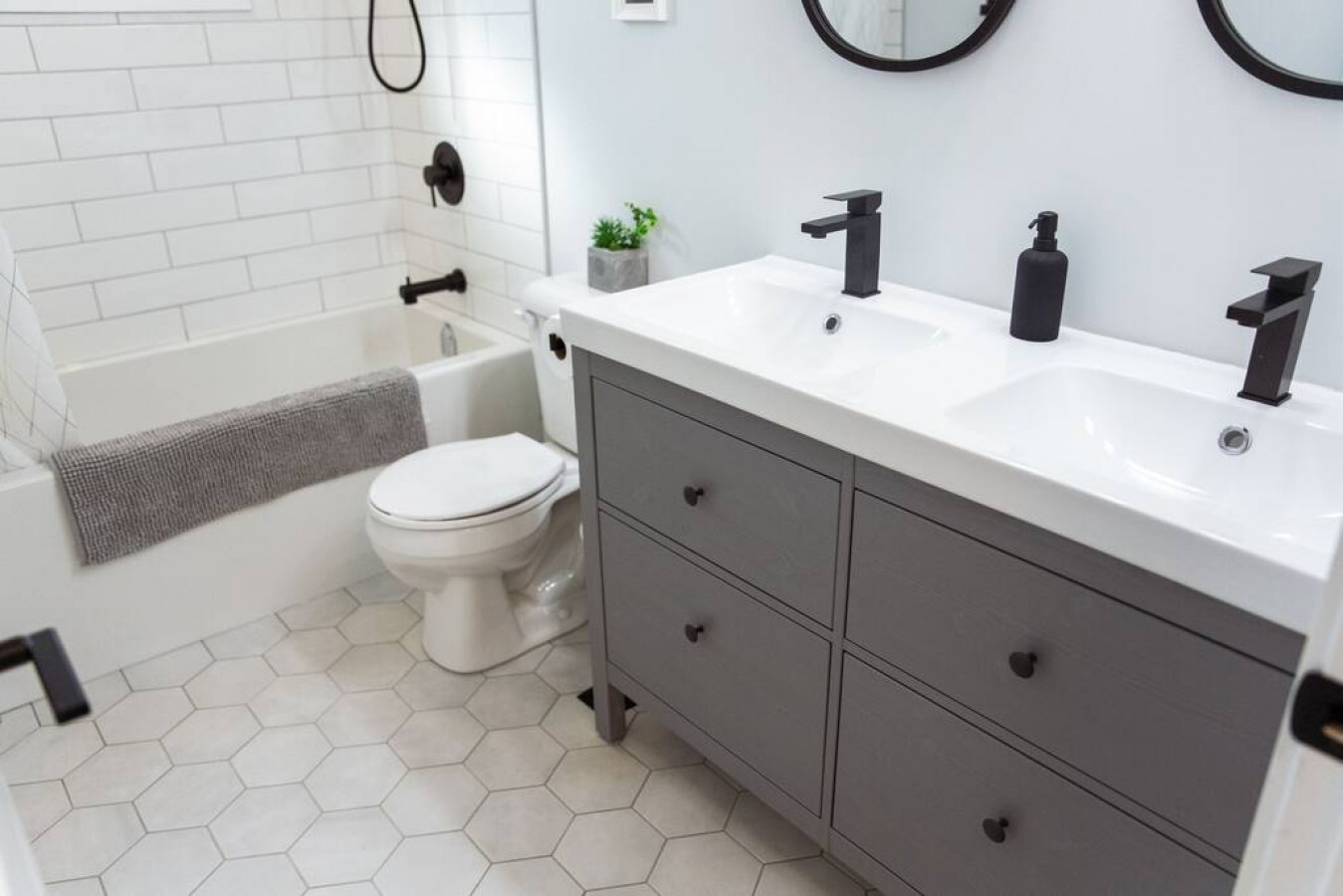 You feel a sense of calm as you enter the bathroom, where the thoughtful design and high-quality materials create a serene environment.