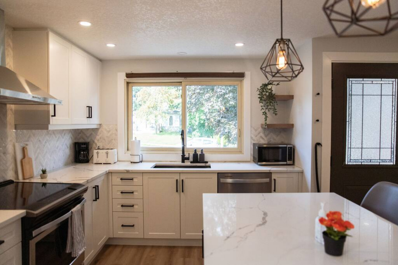The kitchen invites you to experiment with new recipes, offering a stylish and practical space to cook and create.