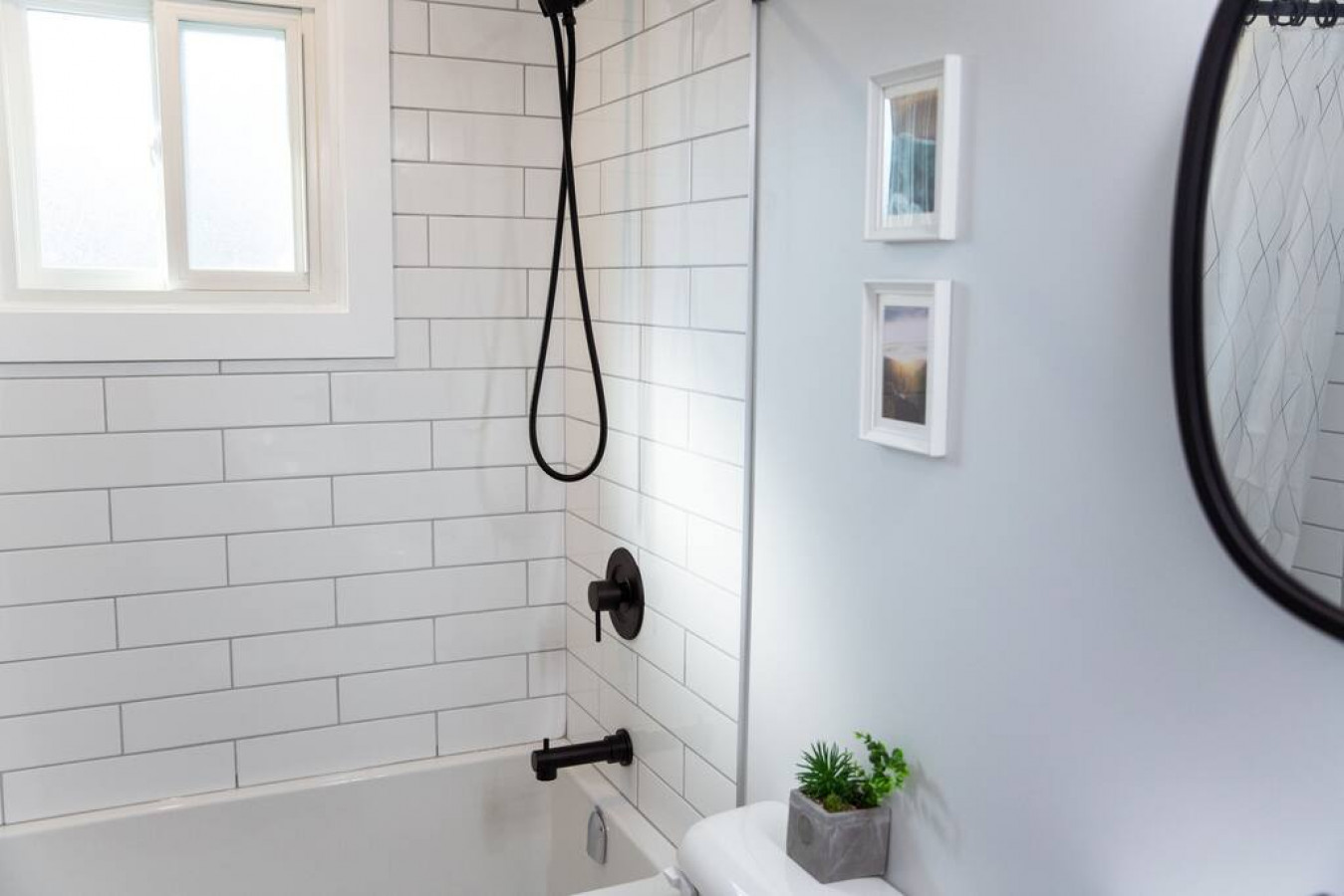 You feel a sense of calm as you enter the bathroom, where the thoughtful design and high-quality materials create a serene environment.