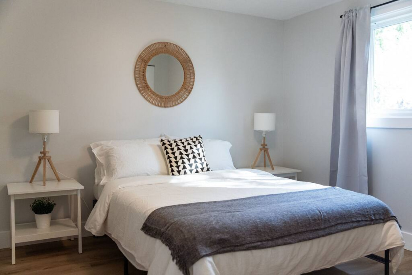 The bedroom’s serene ambiance invites you to relax, with a plush bed that promises a restful night's sleep.