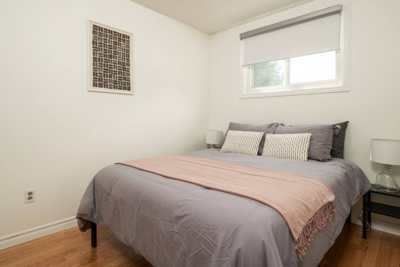 Cute spacious bedroom with queen bed that sleeps 2. Memory foam mattress with comfort in mindCozy bedroom with nightstands and blindsComfortable pillows with new sheets