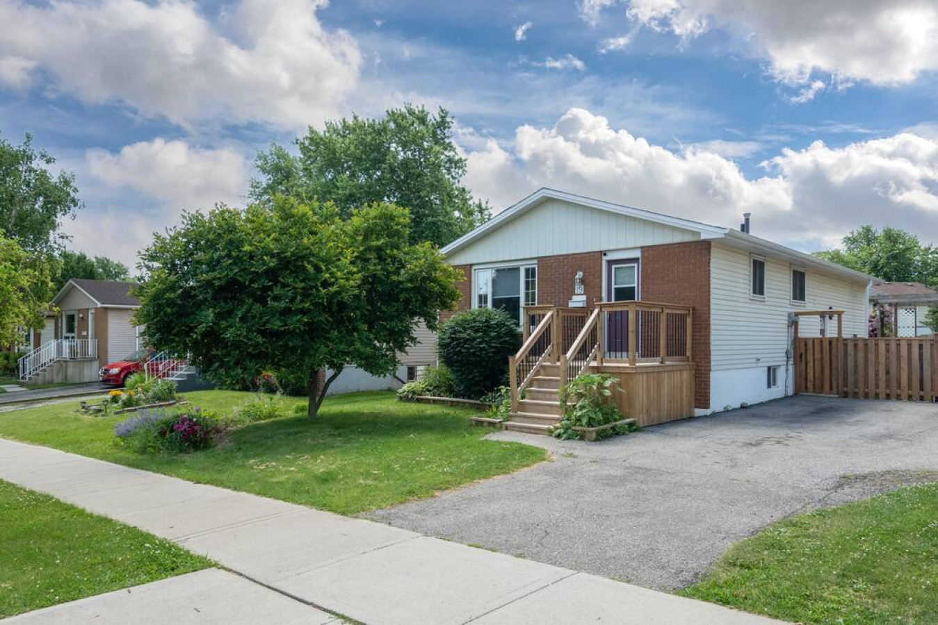 Beautiful exterior with new wood porch