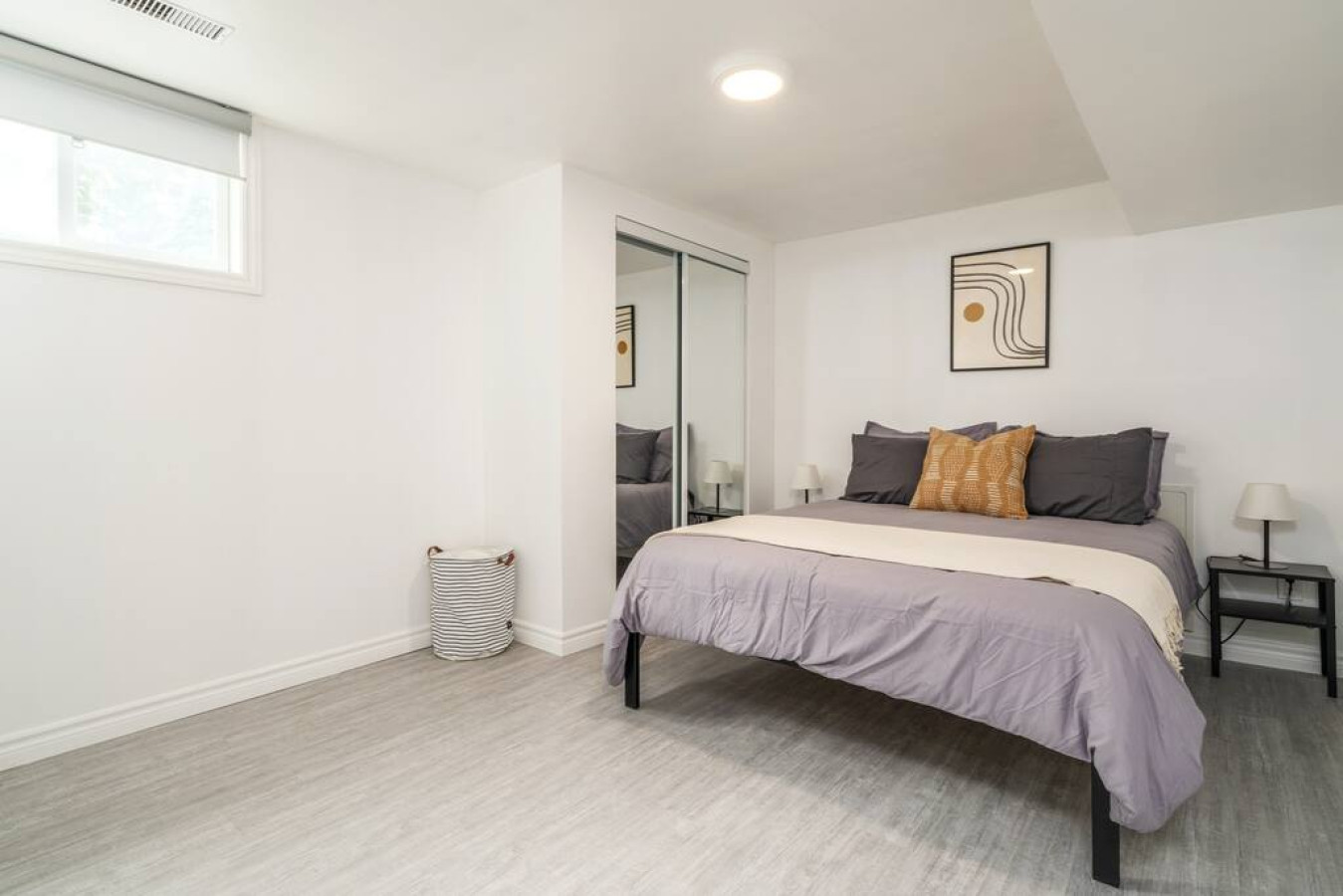 Cute spacious bedroom with queen bed that sleeps 2. Memory foam mattress with comfort in mindCozy bedroom with nightstands and blinds