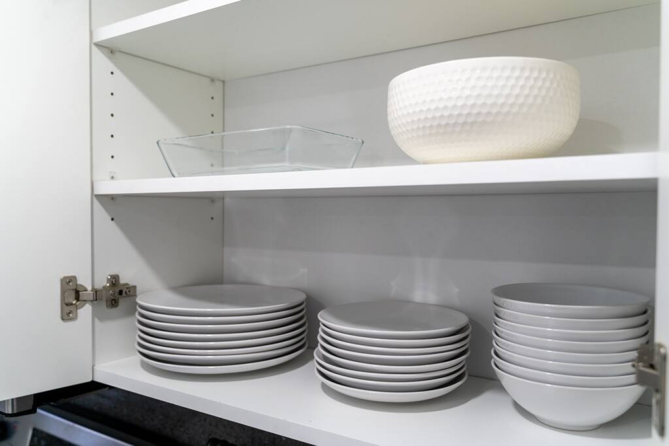 kitchen amenities with plates and bowls