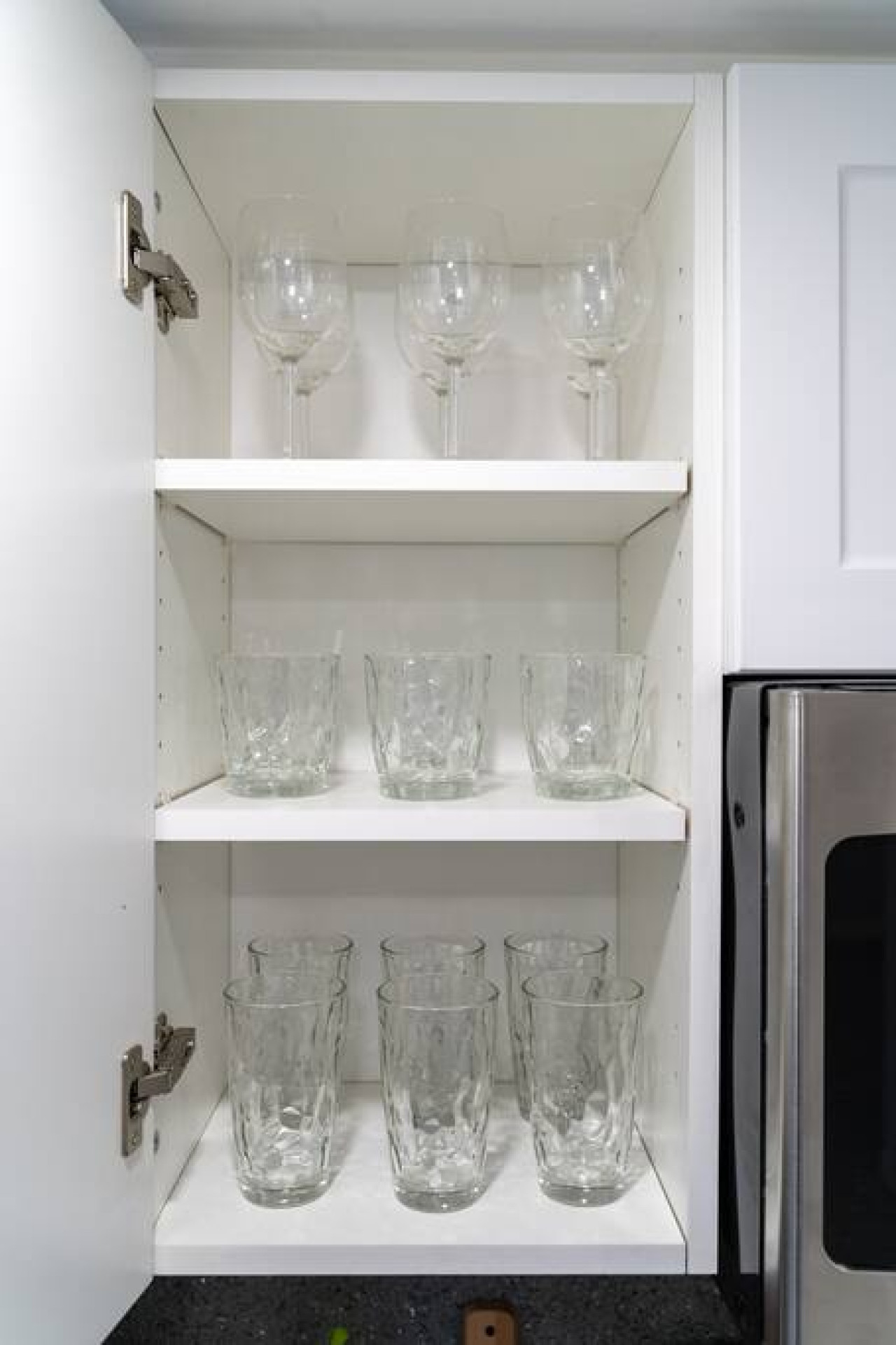 The kitchen’s open layout allows you to move freely as you prepare meals, with everything you need at your fingertips.