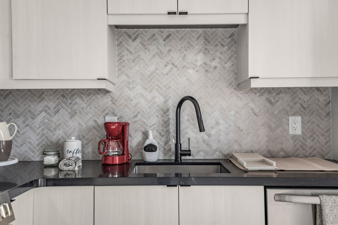 As you step into the kitchen, the clean lines and functional design make you eager to start cooking your favorite dishes.