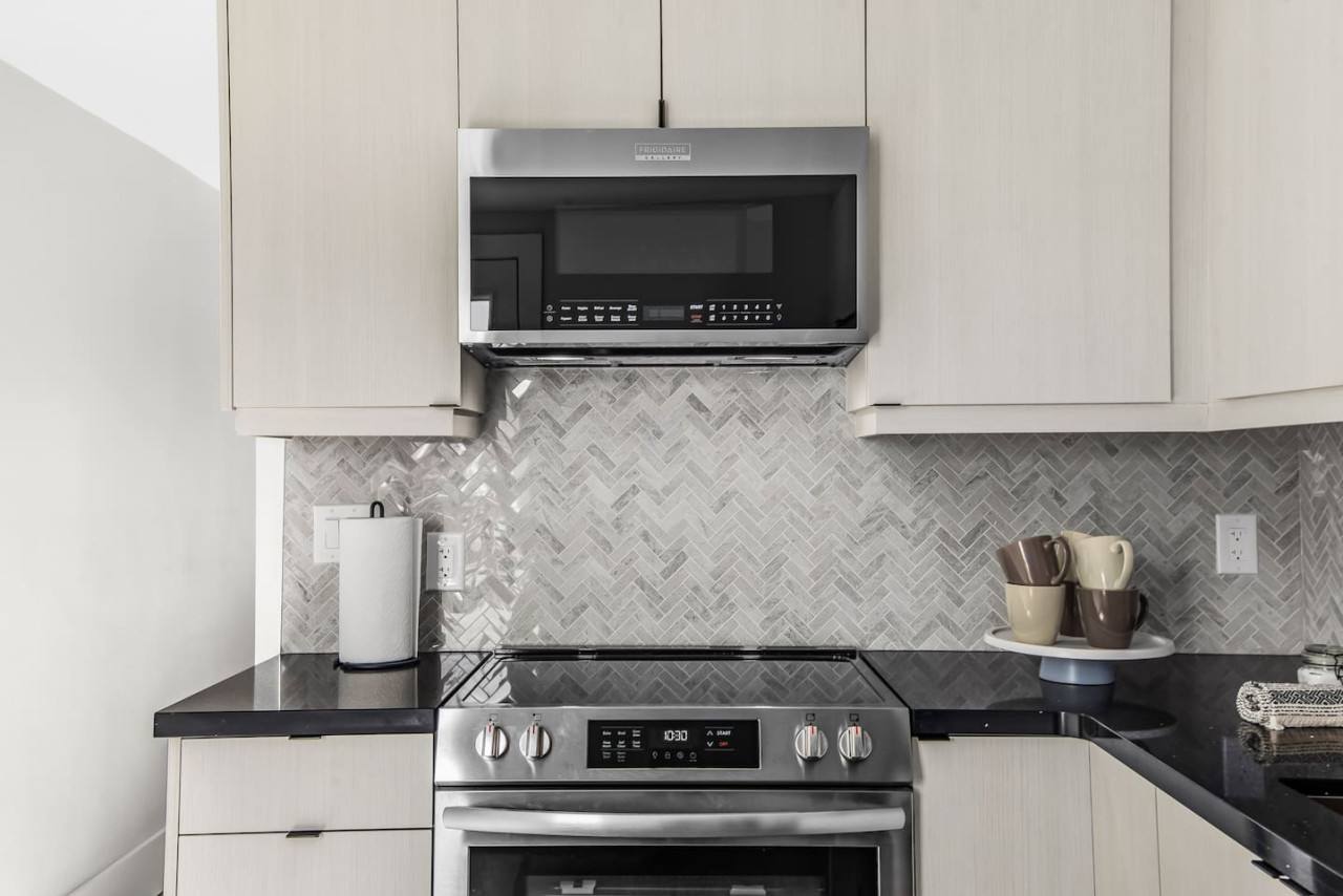 As you step into the kitchen, the clean lines and functional design make you eager to start cooking your favorite dishes.