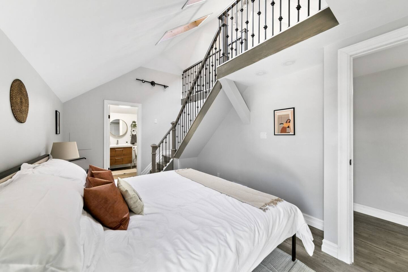 The stairs are both functional and beautiful, with a design that enhances the home’s aesthetic appeal.
