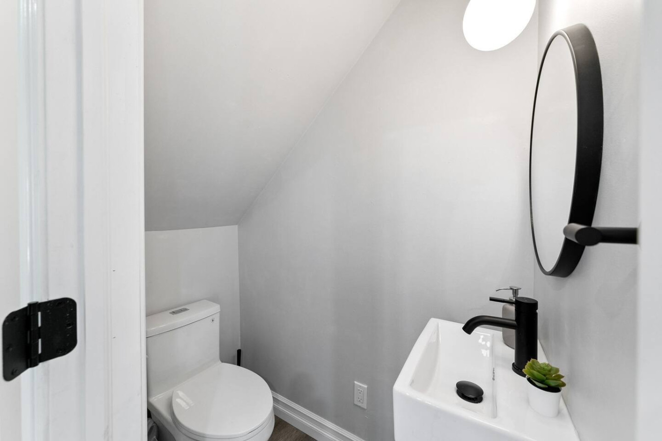 As you step into the bathroom, the clean lines and soothing colors create a space where you can relax and refresh.