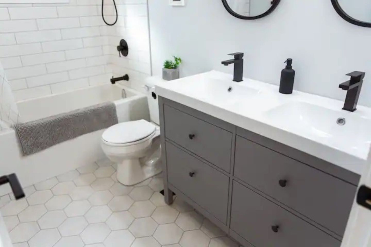 As you step into the bathroom, the clean lines and soothing colors create a space where you can relax and refresh.