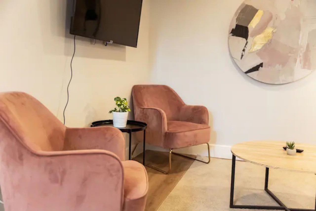 Once you enter the living room you'll find a space that feels both luxurious and cozy, perfect for unwinding after a long day.