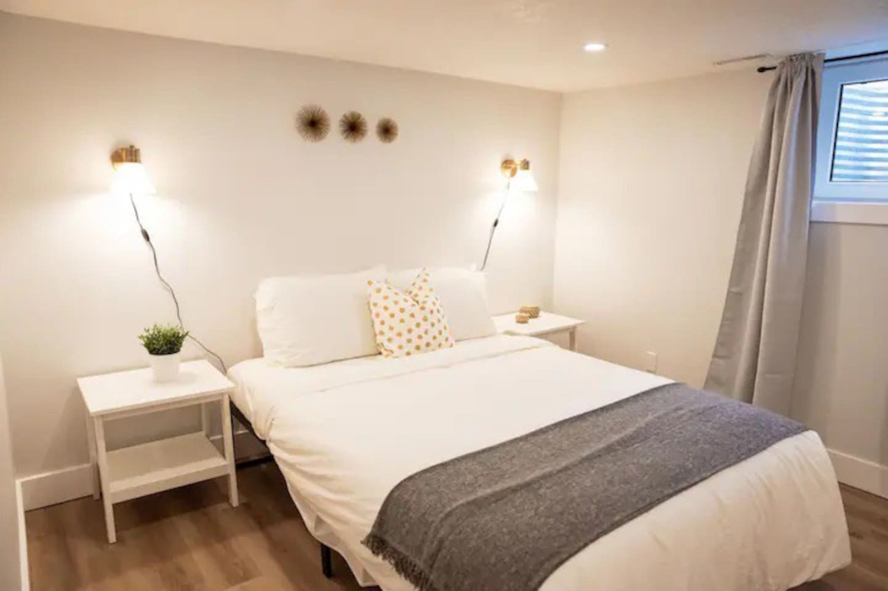 Spacious bedroom with stylish decor, perfect for unwinding after a day of exploring the local area.