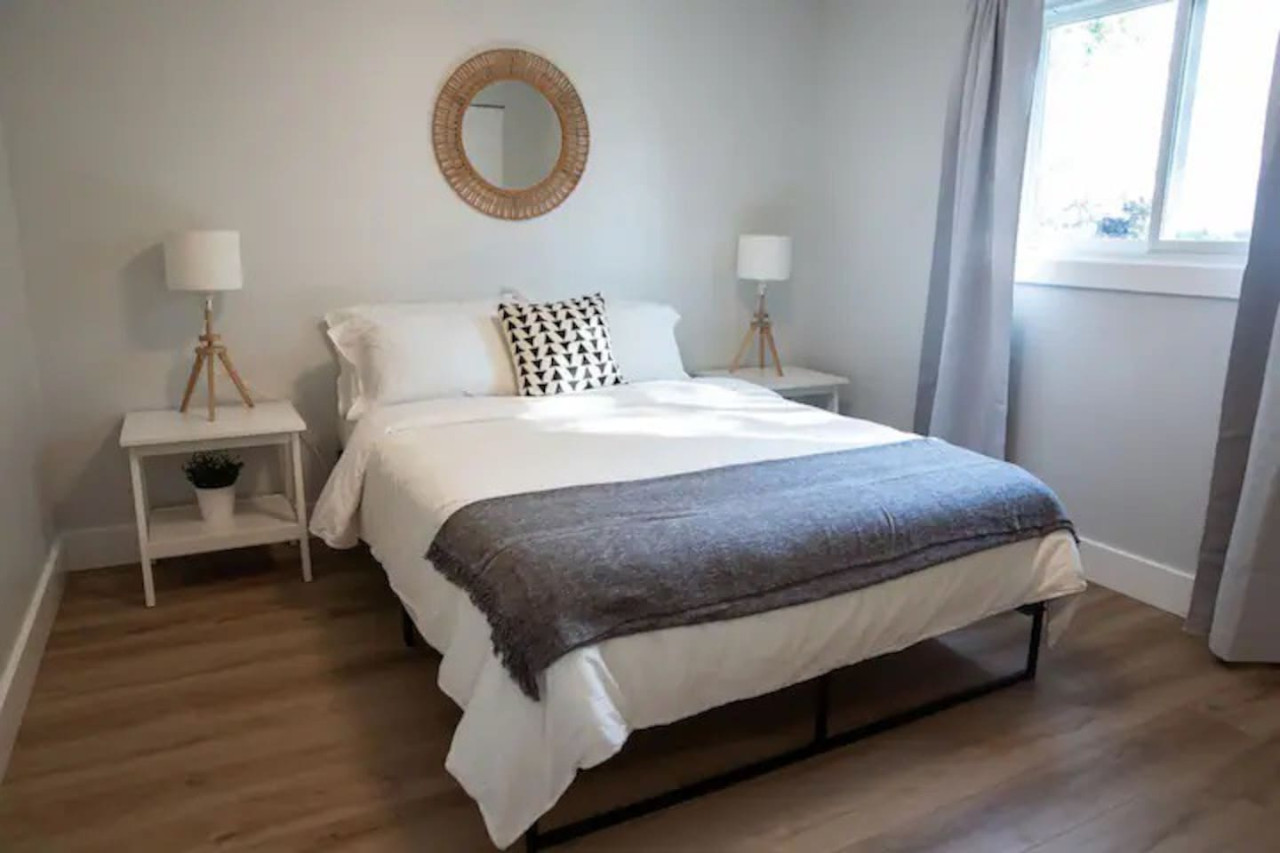 Spacious bedroom with stylish decor, perfect for unwinding after a day of exploring the local area.