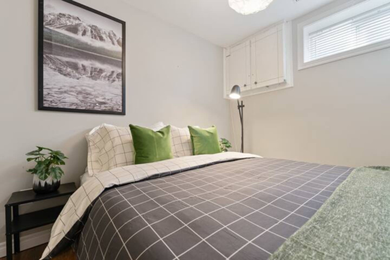 Spacious bedroom with stylish decor, perfect for unwinding after a day of exploring the local area.