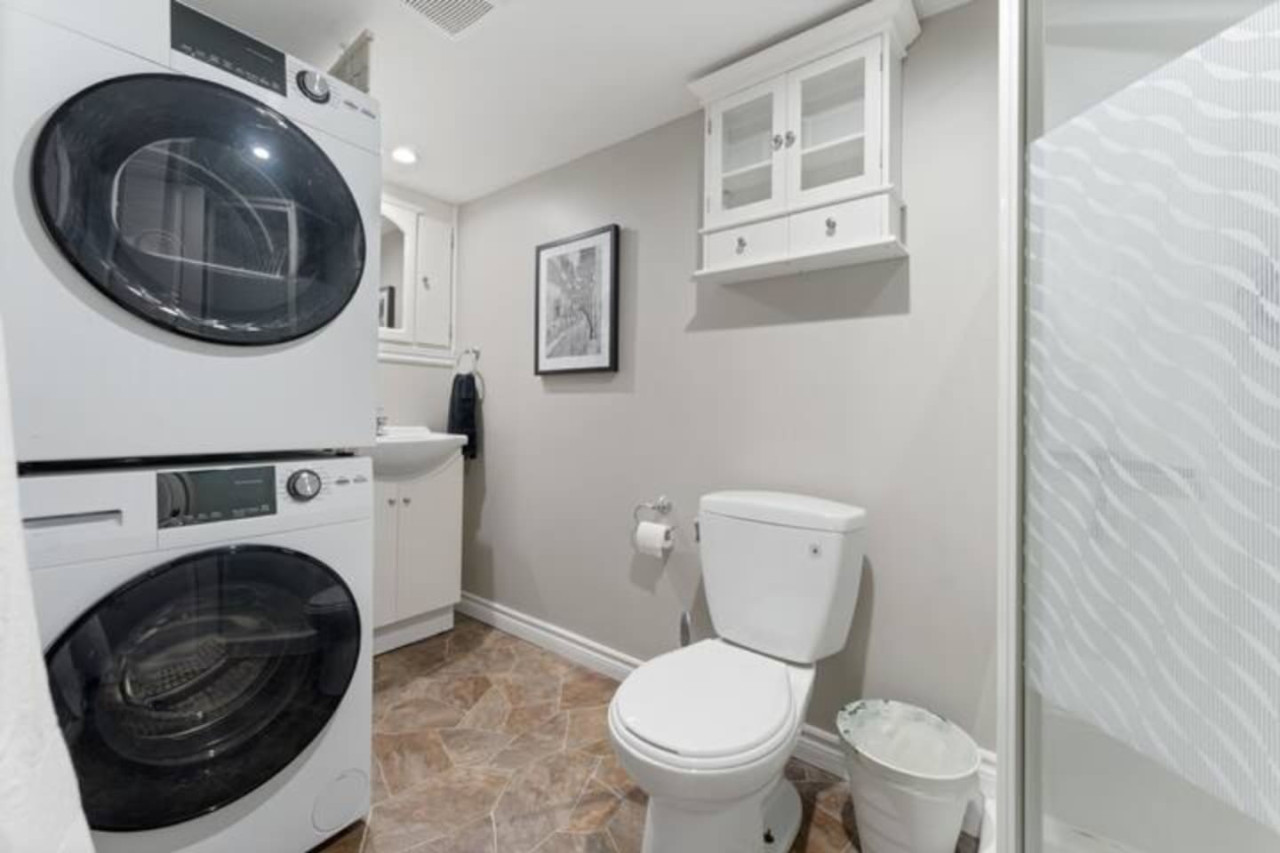 You feel a sense of calm as you enter the bathroom, where the thoughtful design and high-quality materials create a serene environment.