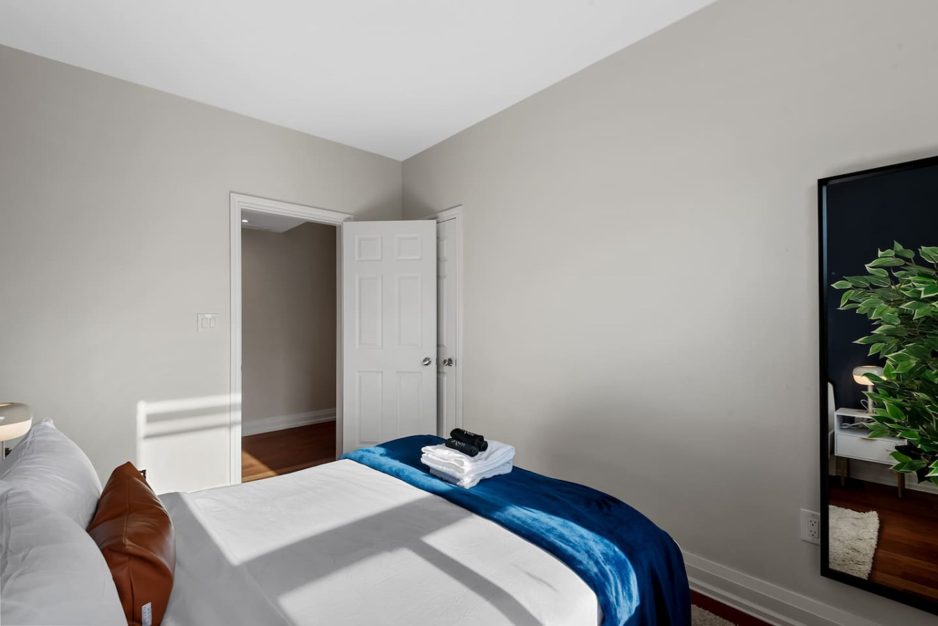 Spacious bedroom with stylish decor, perfect for unwinding after a day of exploring the local area.