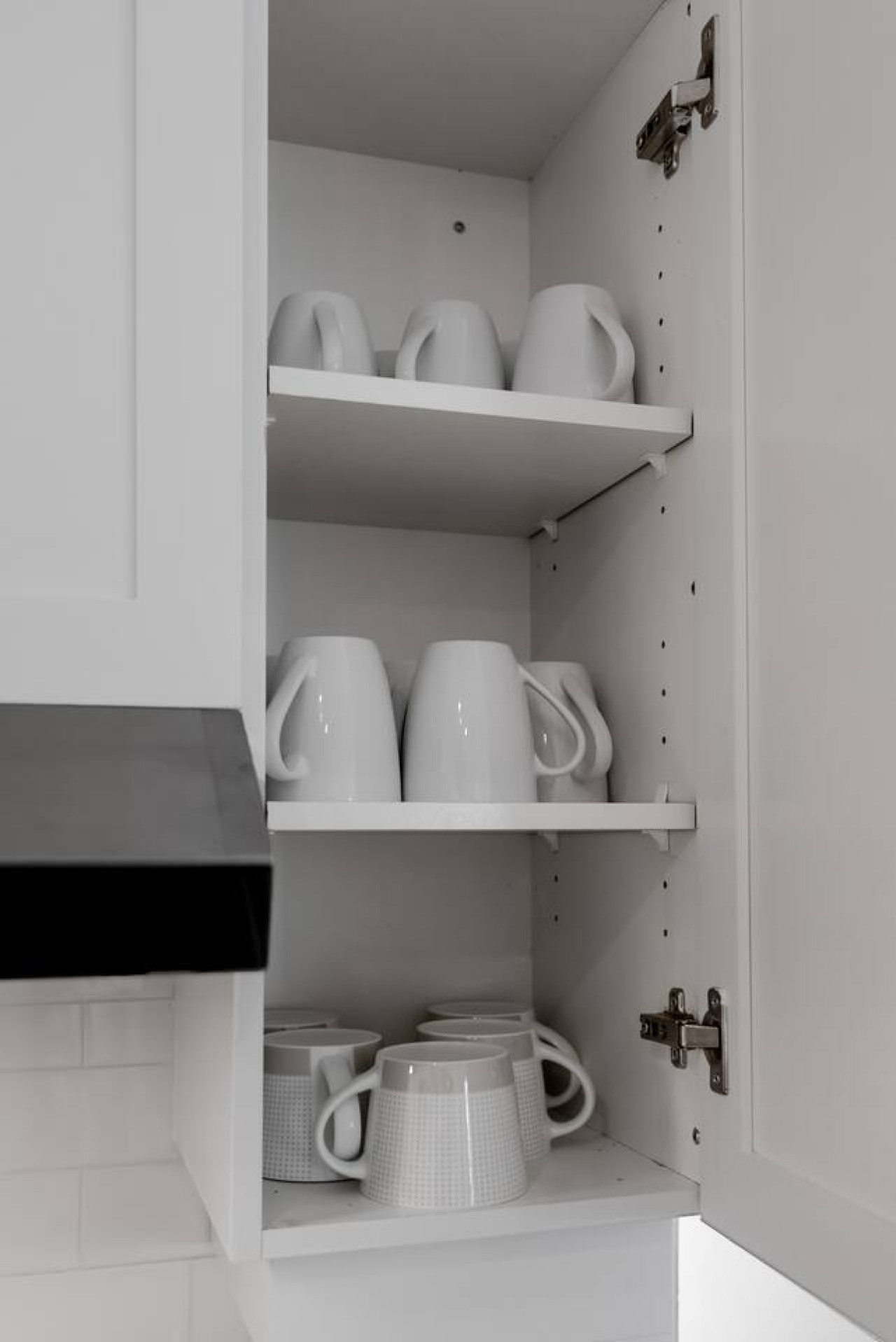 The kitchen’s open layout allows you to move freely as you prepare meals, with everything you need at your fingertips.