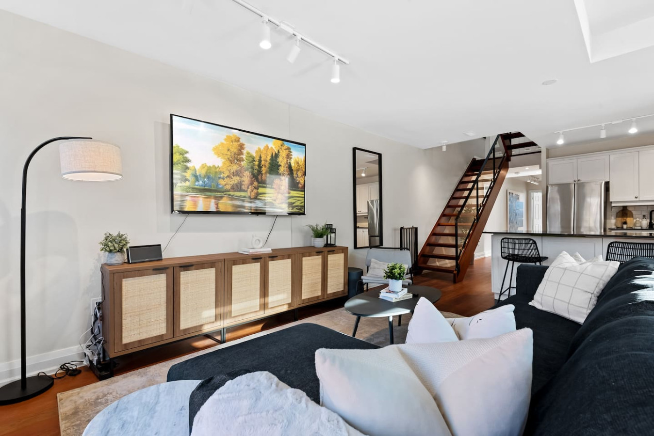 Once you enter the living room you'll find a space that feels both luxurious and cozy, perfect for unwinding after a long day.