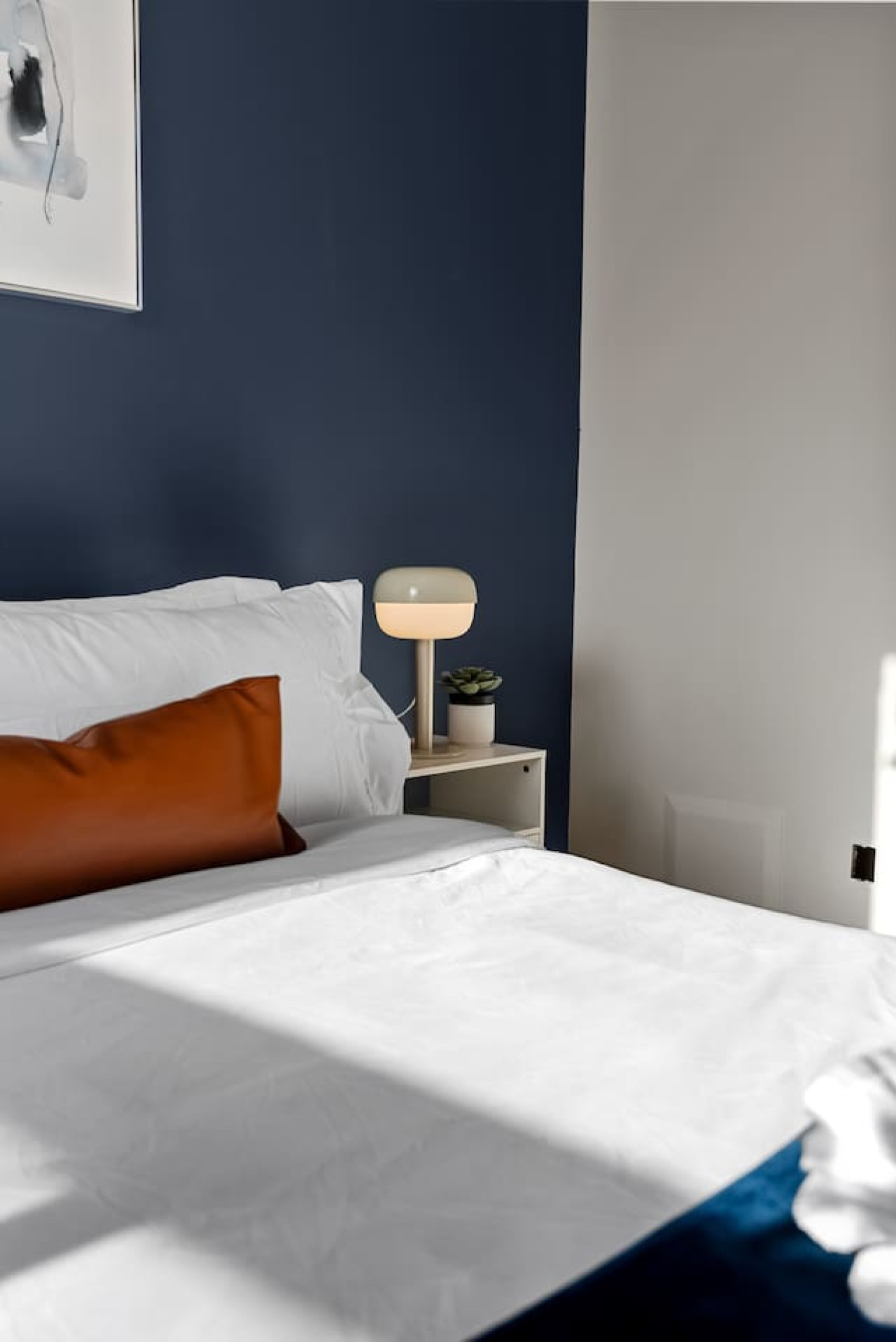 As you lie back on the queen bed, you are surrounded by elegant decor and a soothing color palette that calms the senses.