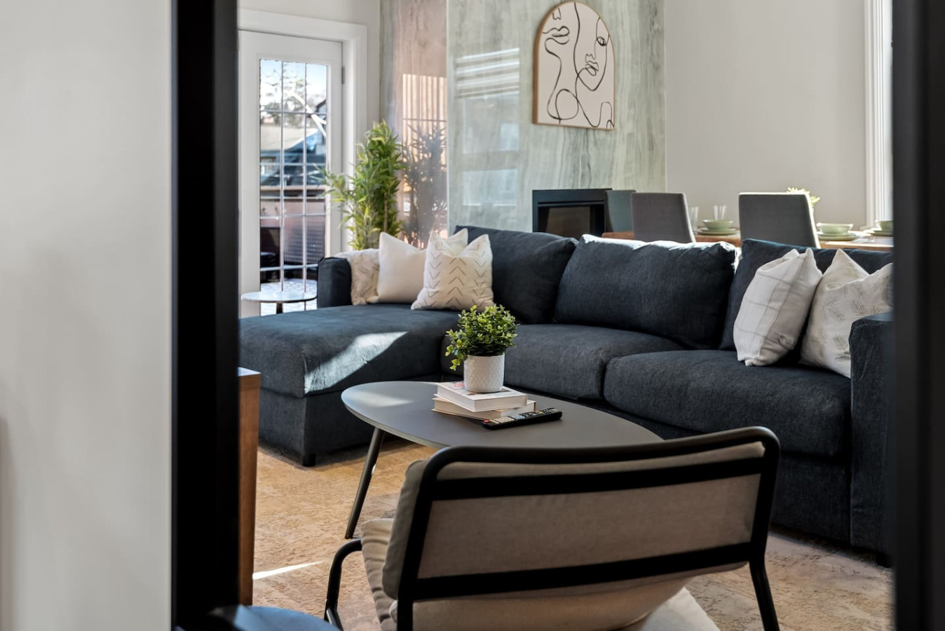 As you take a seat in the living room, the comfortable furniture and tasteful design make it easy to unwind.