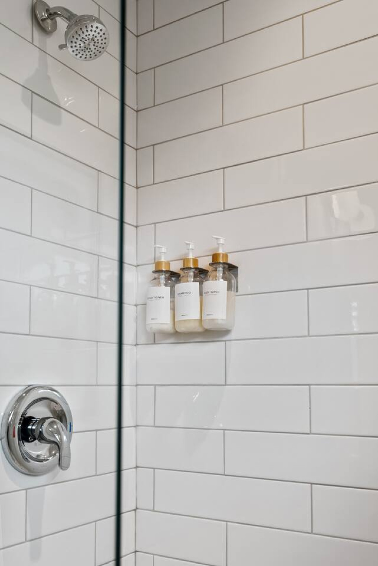 You feel a sense of calm as you enter the bathroom, where the thoughtful design and high-quality materials create a serene environment.