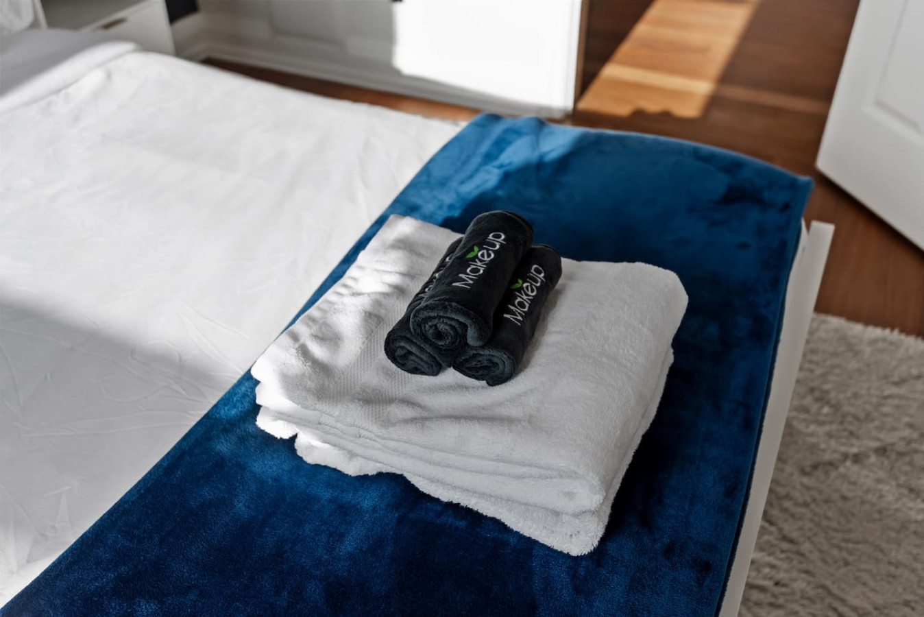 The bedroom offers a luxurious retreat, with a bed that promises restful nights and a room that feels like a private oasis.