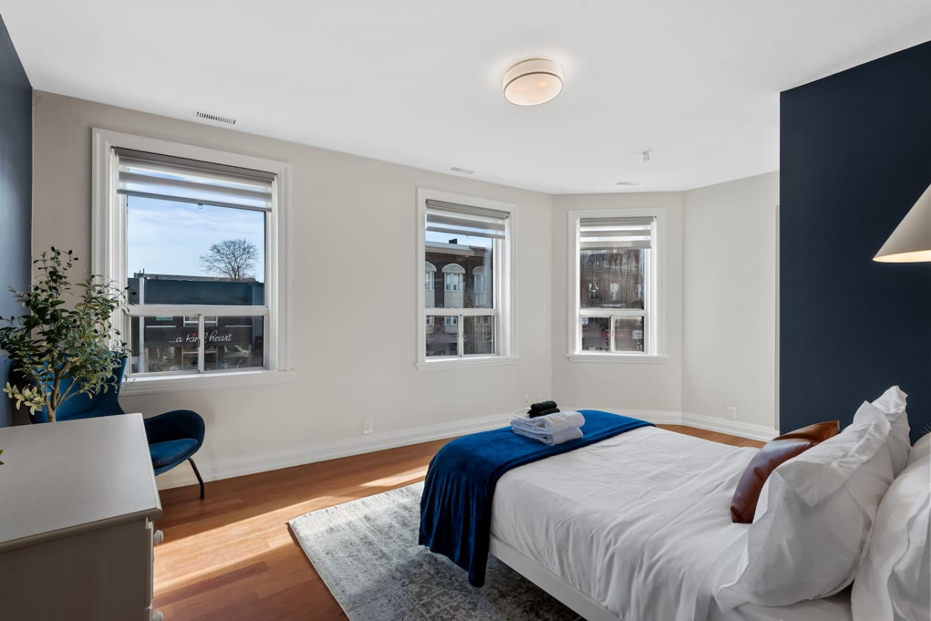 The bedroom’s serene ambiance invites you to relax, with a plush bed that promises a restful night's sleep.