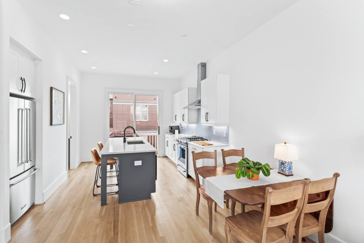 Light & airy with dining room table seating for 4 or bar seating for 2.