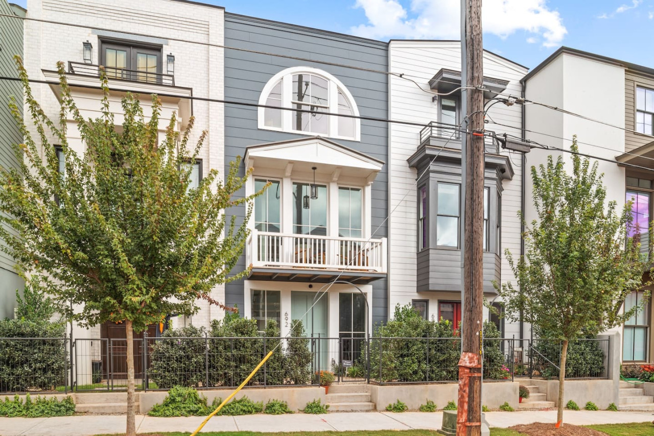 Front entrance with barn door. Street parking available.