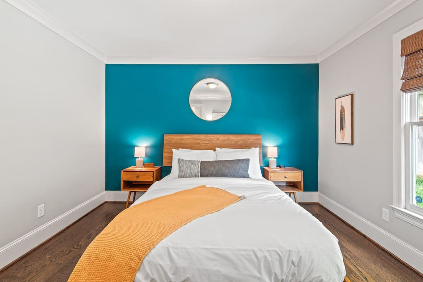 Master bedroom with queen-sized bed, en suite bathroom with walk-in shower, and walk-in closet.