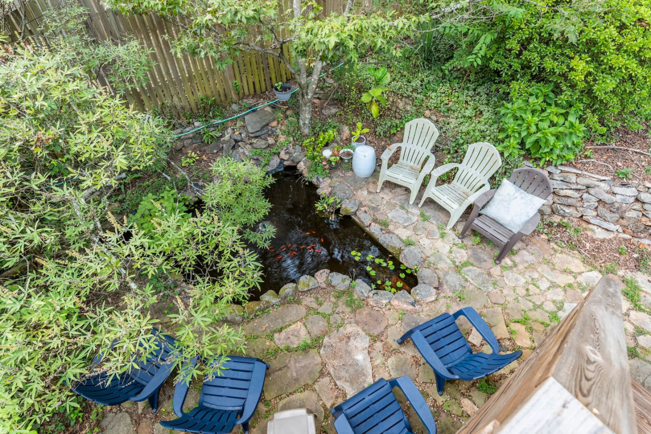 Feed the fish and enjoy a glass of wine around the pond at the end of the day