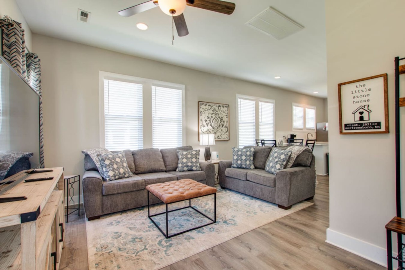 Cozy & Stylish Living Room
Unwind in this bright, welcoming space featuring plush seating, a large Smart TV, and thoughtful décor. Perfect for movie nights, morning coffee, or relaxing after a day exploring Murfreesboro.