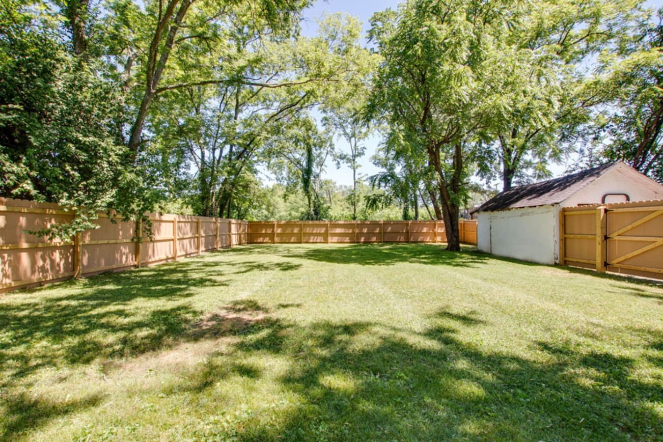Our fenced-in backyard offers a ton of room to relax and play.