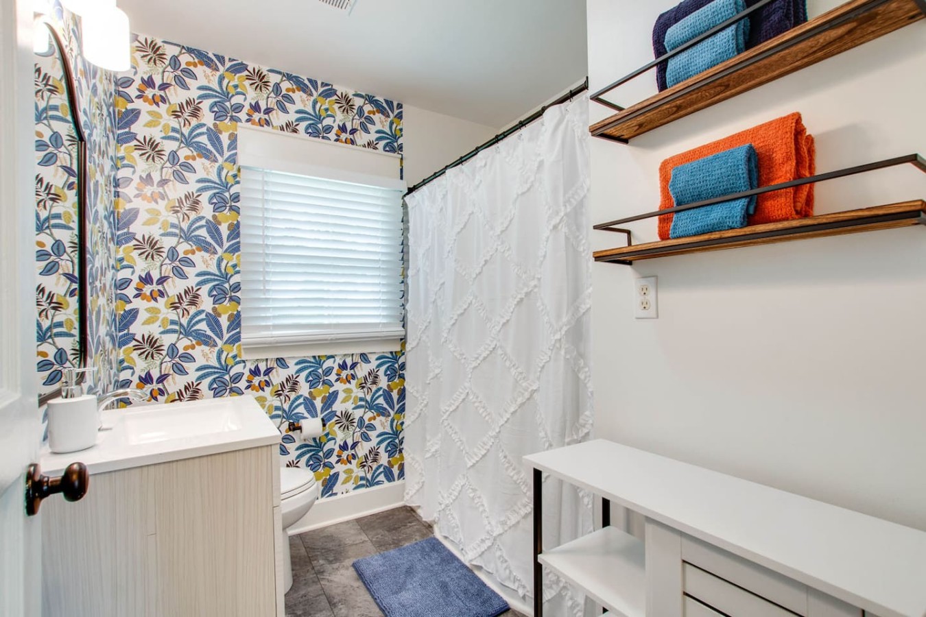 Full size bathroom that services the guest room and kid's/bunk room.