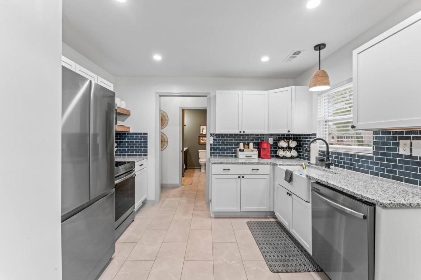 Fully equipped kitchen with modern appliances and coffee bar