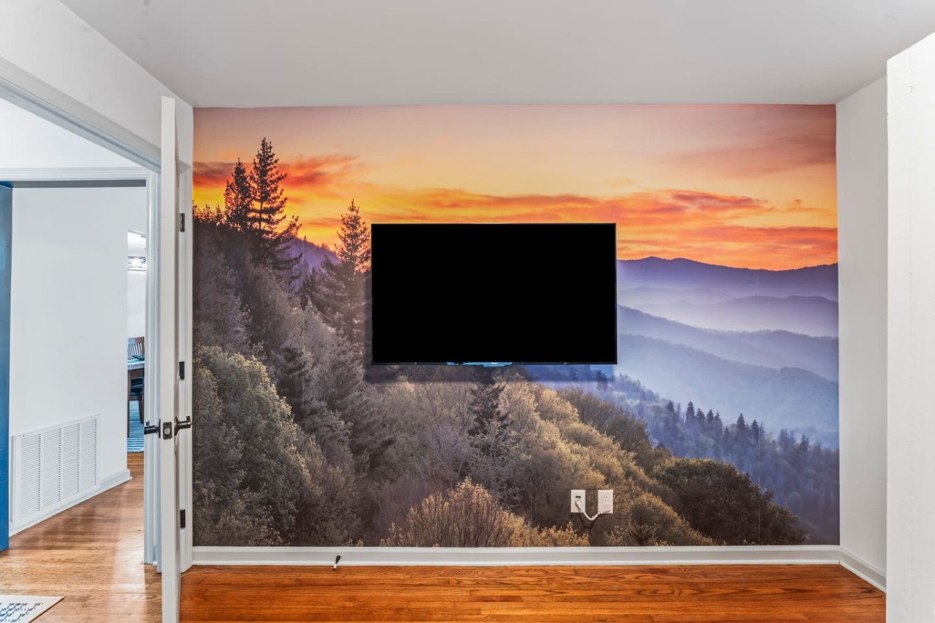 Let your kids dream amidst the beauty of the Tennessee Smoky Mountains mural, a highlight in their cozy retreat at TN Legends Retreat.