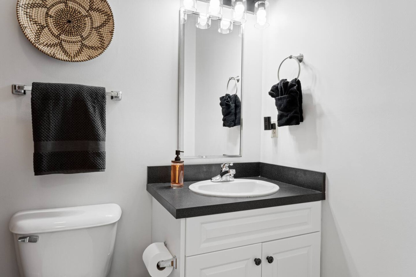 This sleek and modern bathroom is designed with simplicity and style in mind. Featuring ample counter space, elegant fixtures, and soft lighting, it provides all the essentials for a comfortable and refreshing stay at the Scots Suite