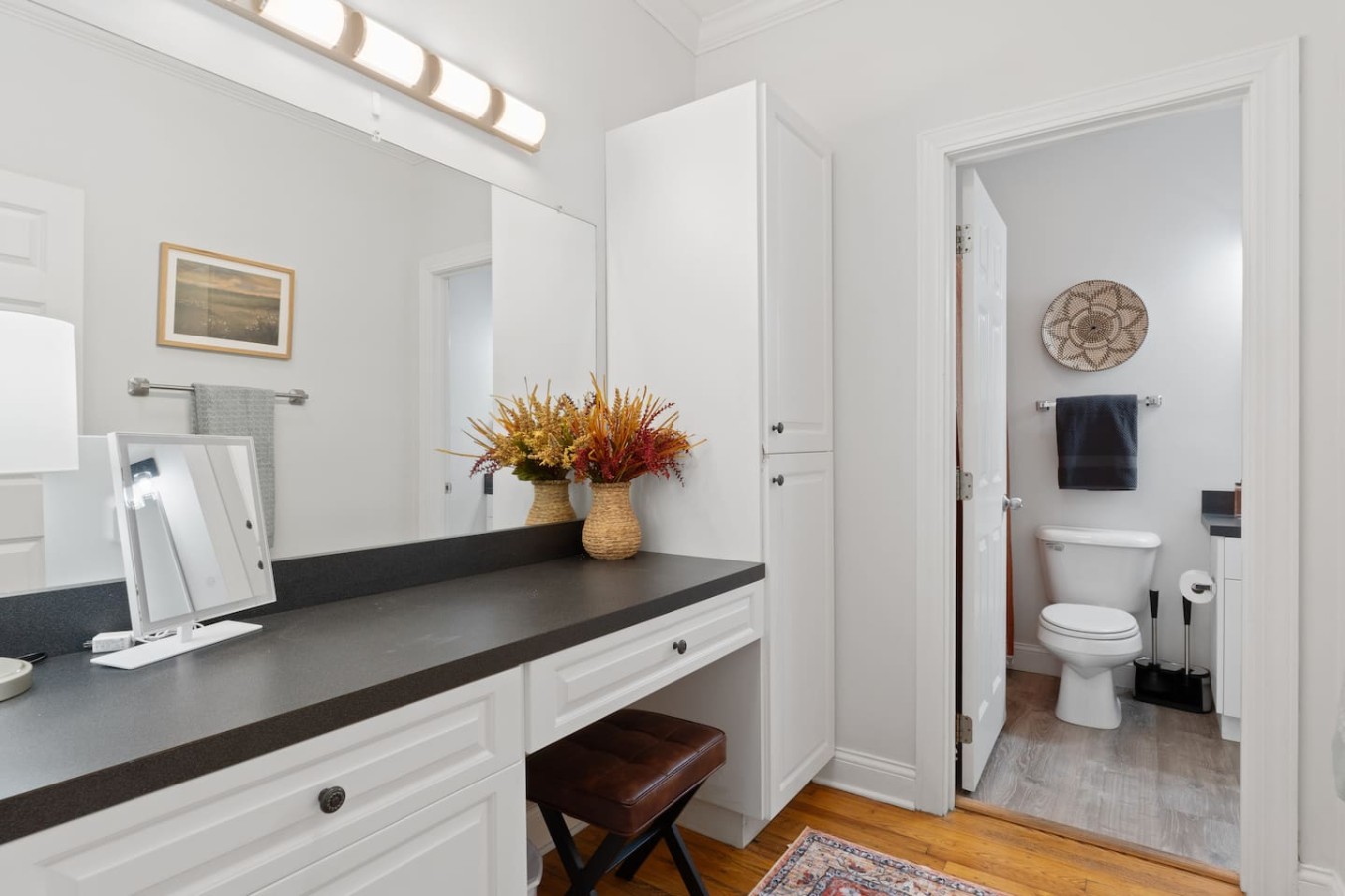 As you enter the Scots Suite, you'll find a spacious powder room and full bathroom immediately to your left. This well-lit area offers plenty of counter space and modern amenities, ensuring comfort and convenience during your stay.