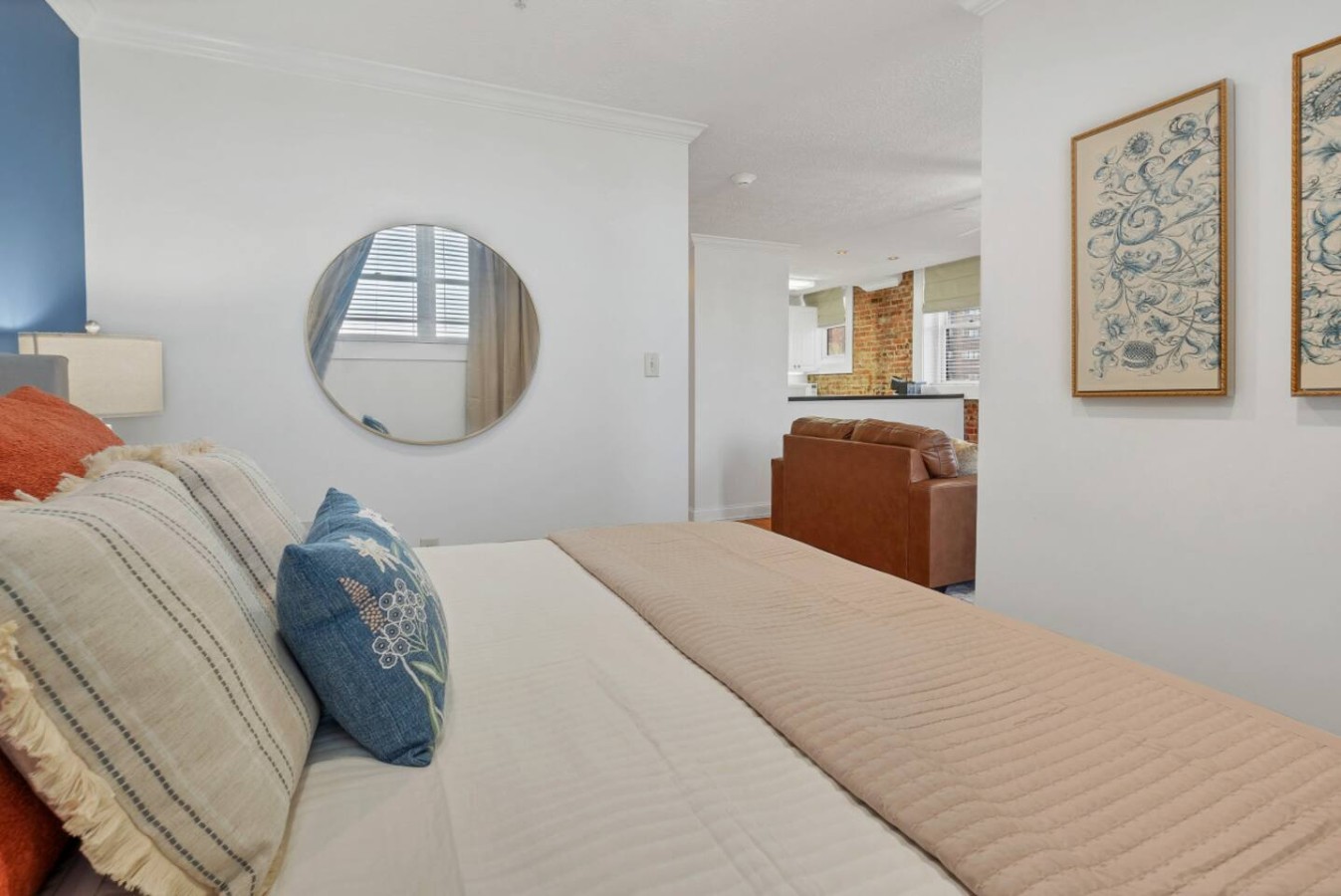 Wake up in an airy space with a cozy king bed, stylish decor, and seamless flow into the living area. Enjoy modern comfort, natural light, and warm tones in this beautifully designed Airbnb retreat.