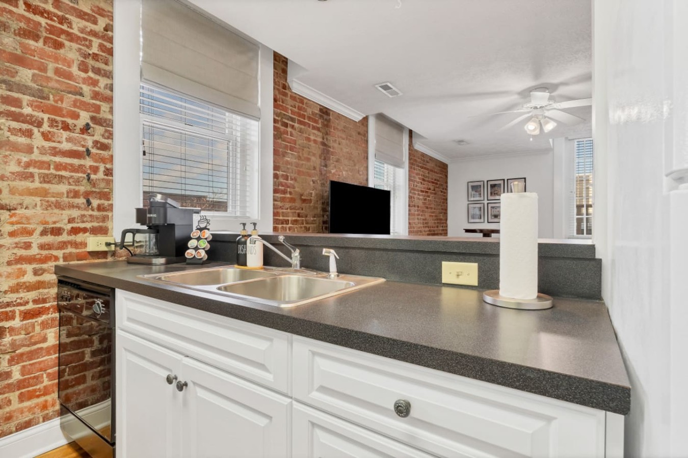 "This open-concept kitchen flows seamlessly into the living space, making it perfect for your downtown Maryville retreat.