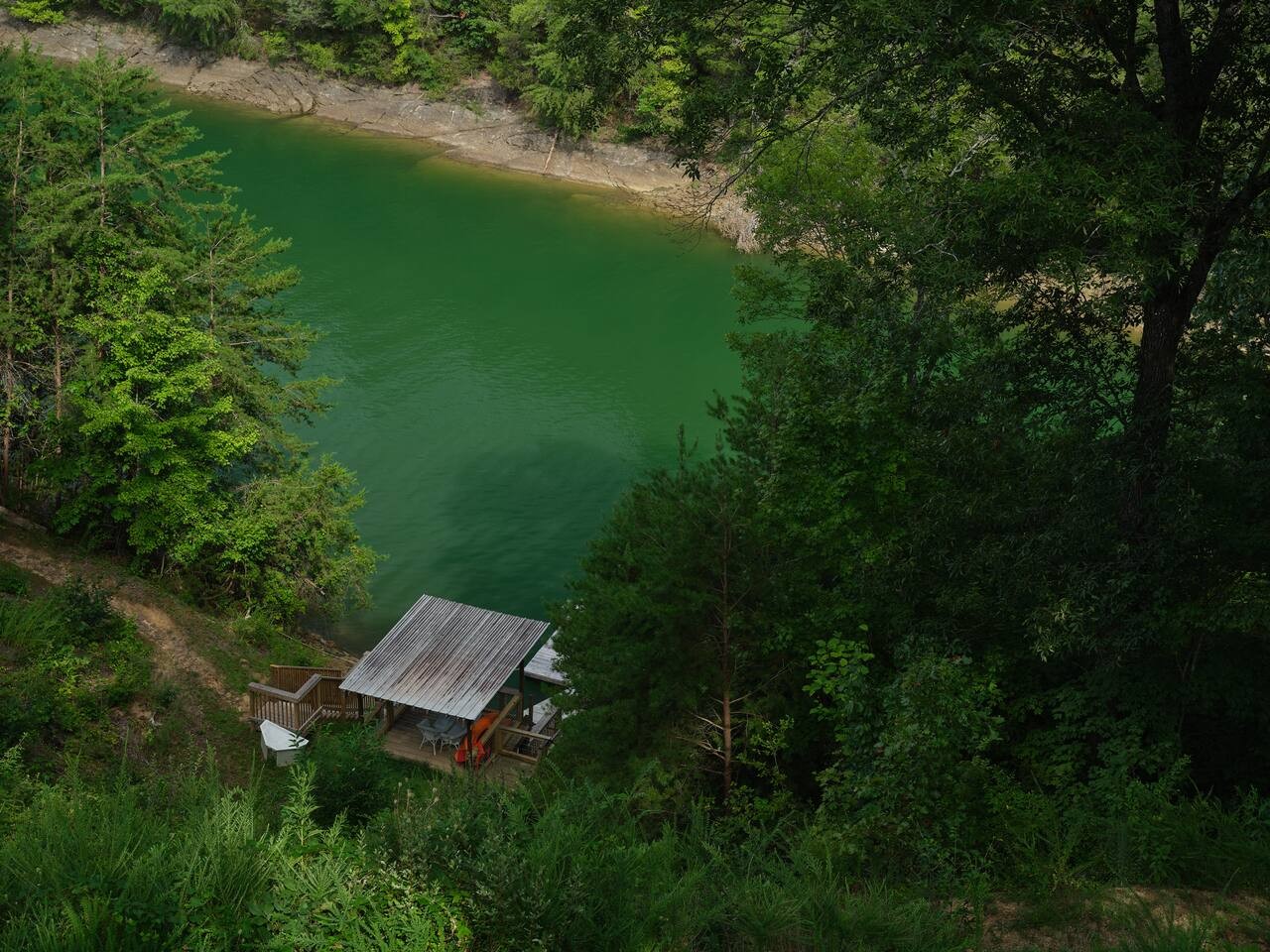 View of the dock from the back porch that is exclusive to In the Orange during your stay.