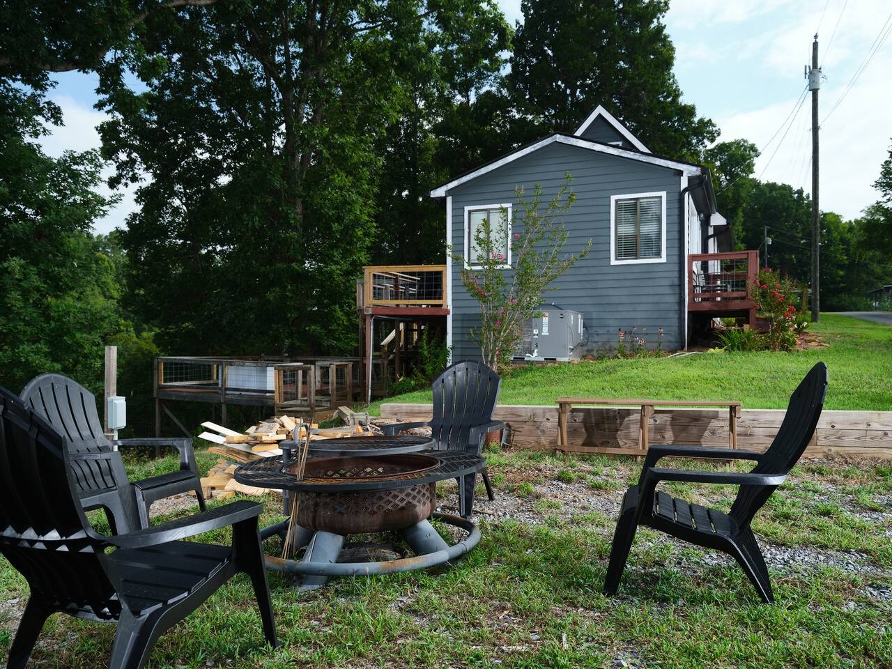This amazing fire pit area is located in the side yard.