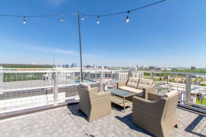 Midtown Skyline Retreat | Rooftop Deck | Game Room