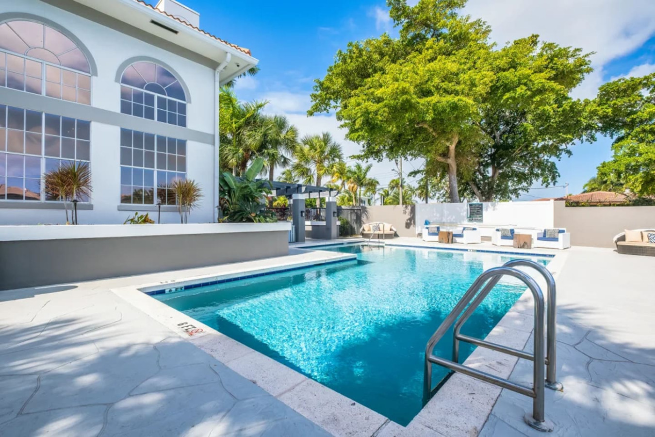 Serene Waterfront 2br | Poolside Living In - Bahamas