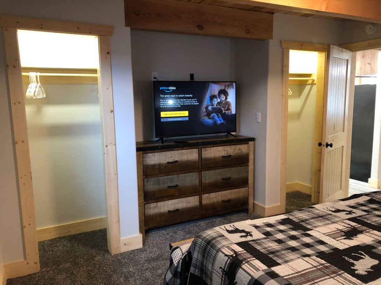 Extra closet space and smart TV in the master bedroom