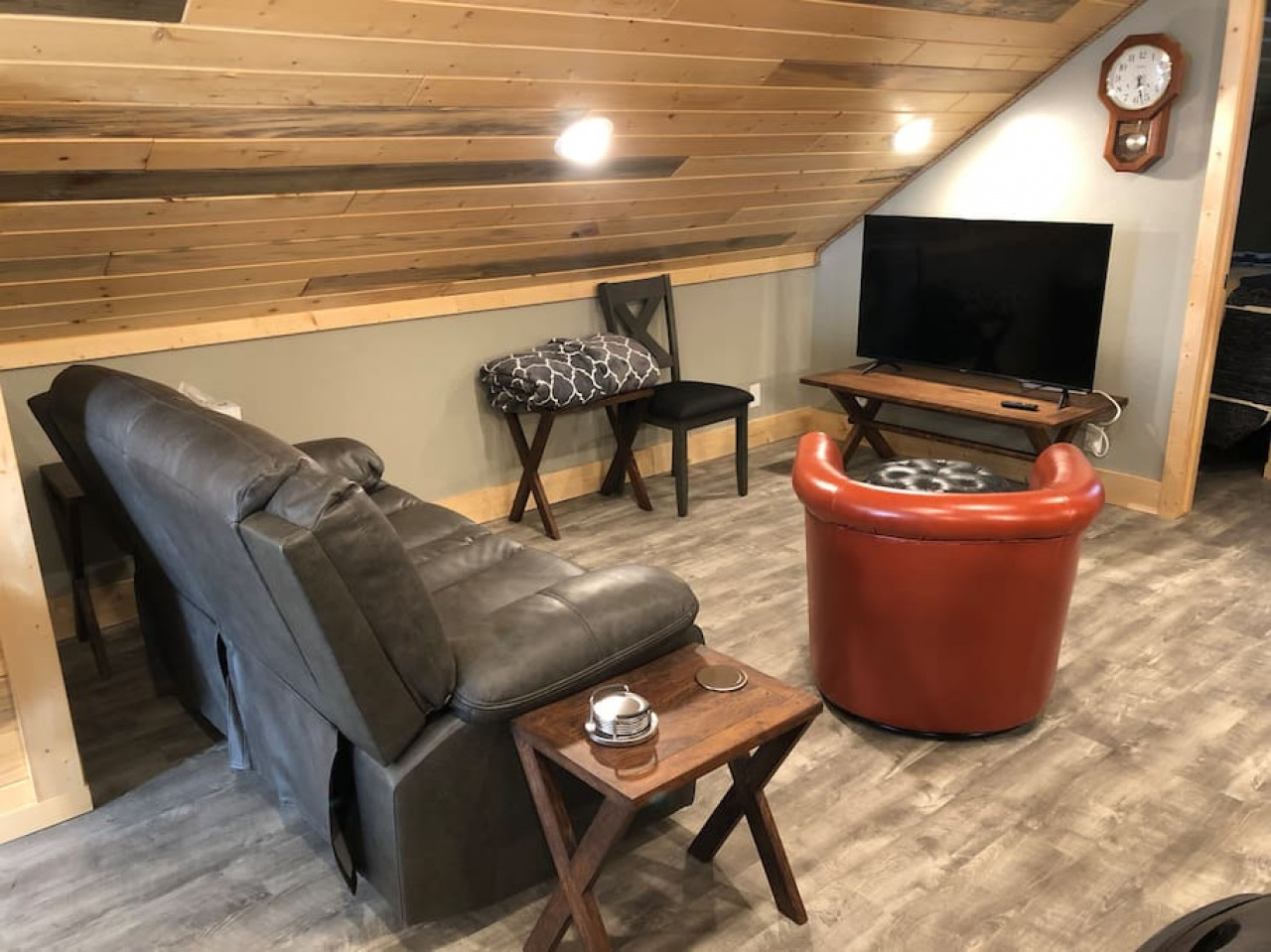 Living room space with smart TV and couch