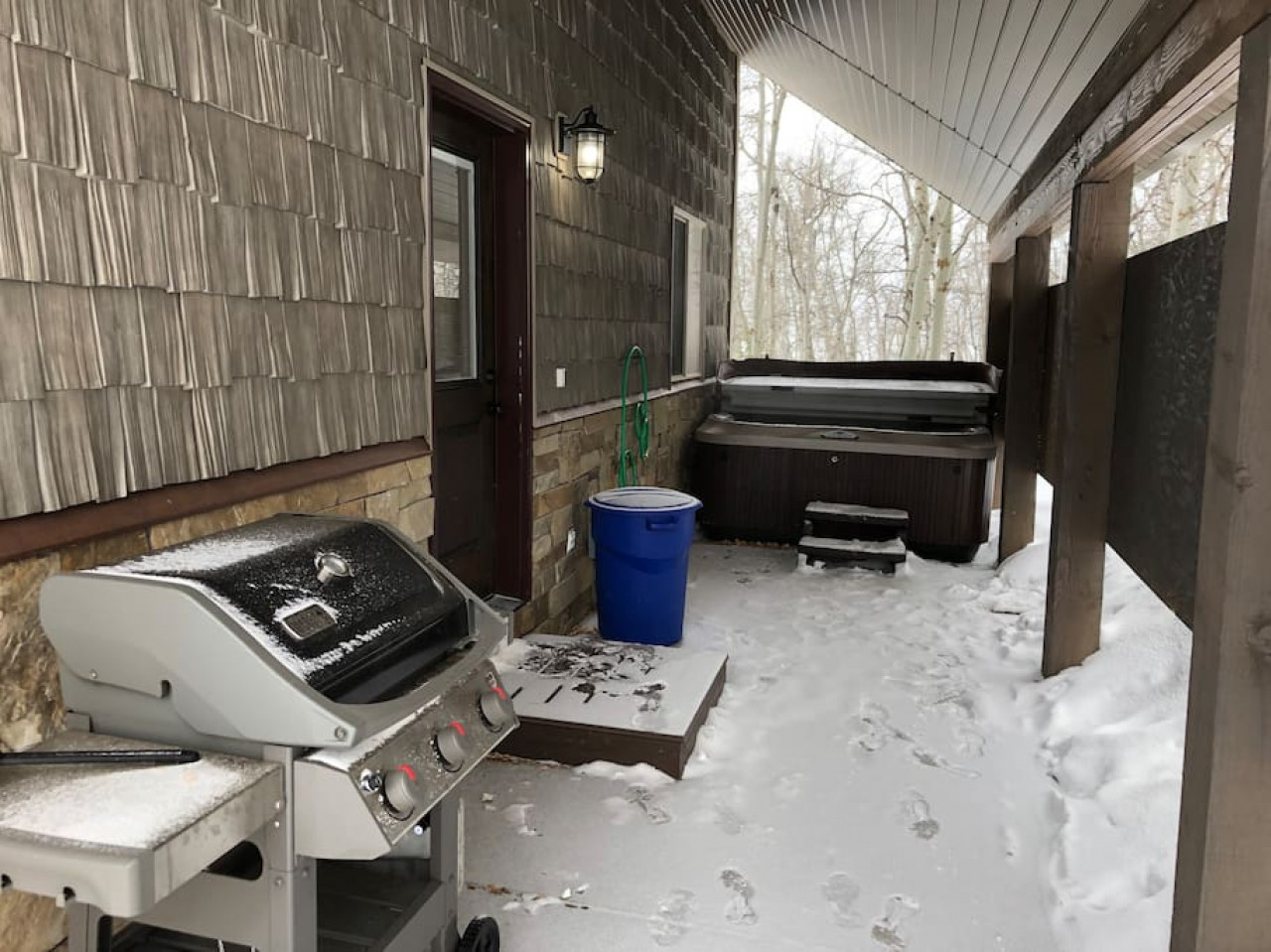 Grill and hot tub right outside on the patio