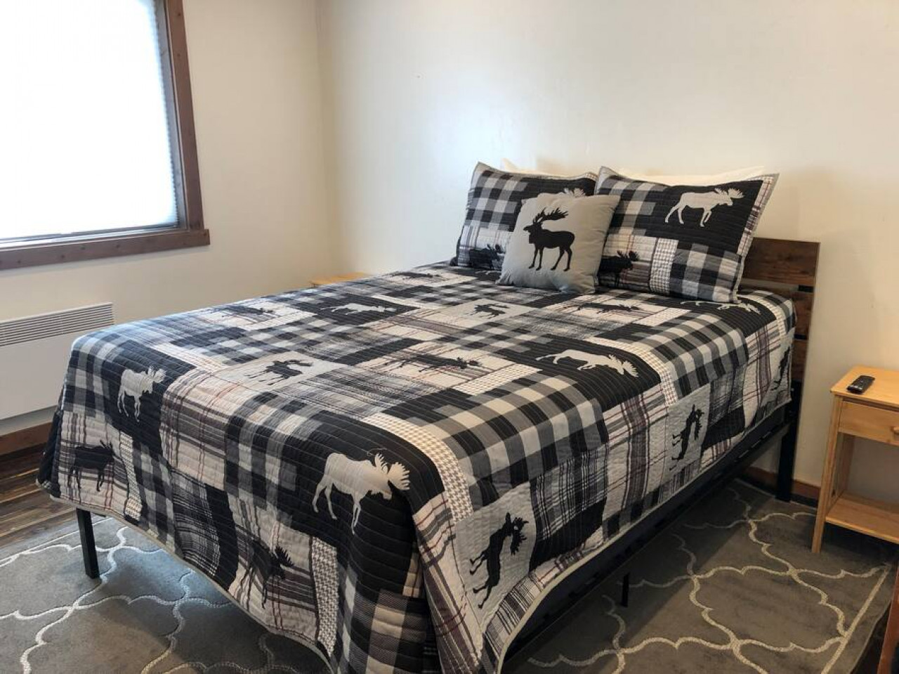 Bedroom with a queen and a smart TV