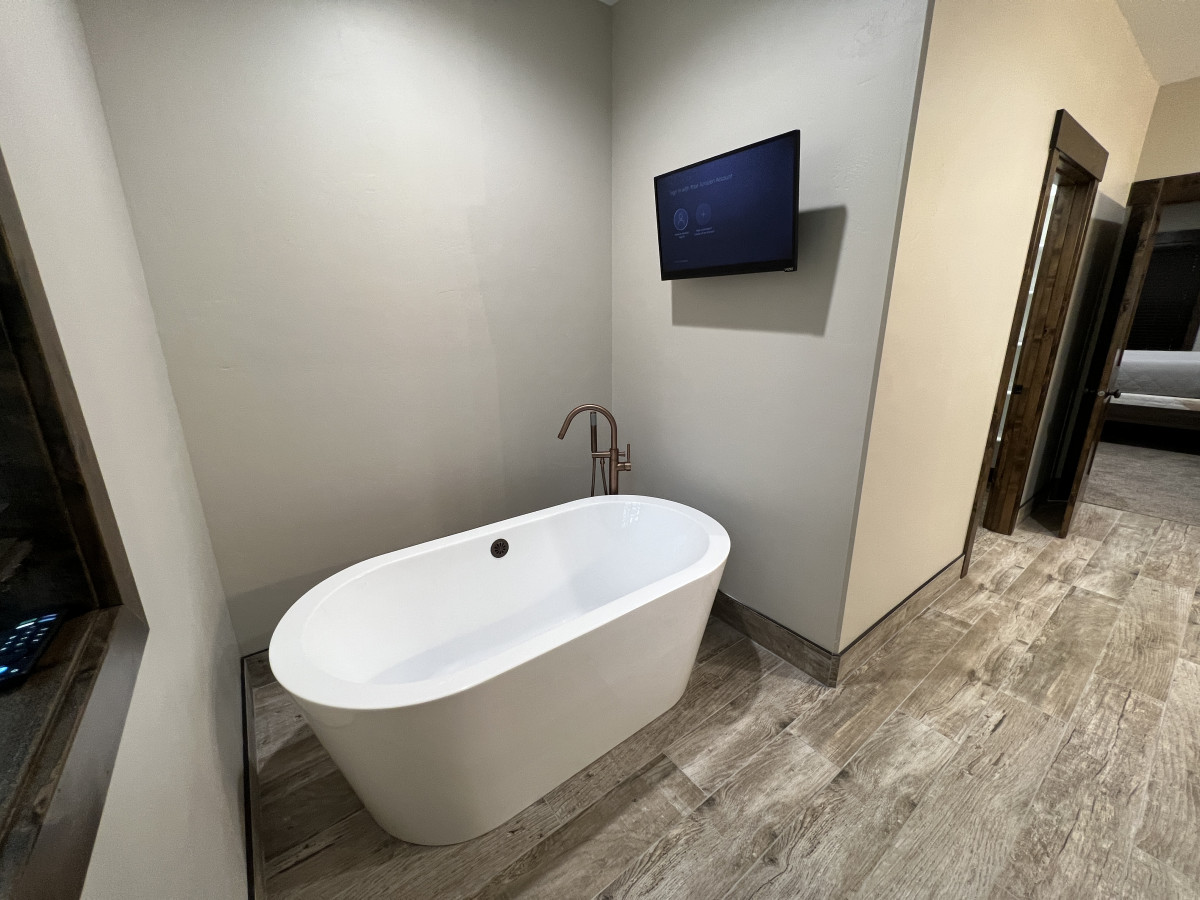 Soak in the tub and watch your favorite show or movie
